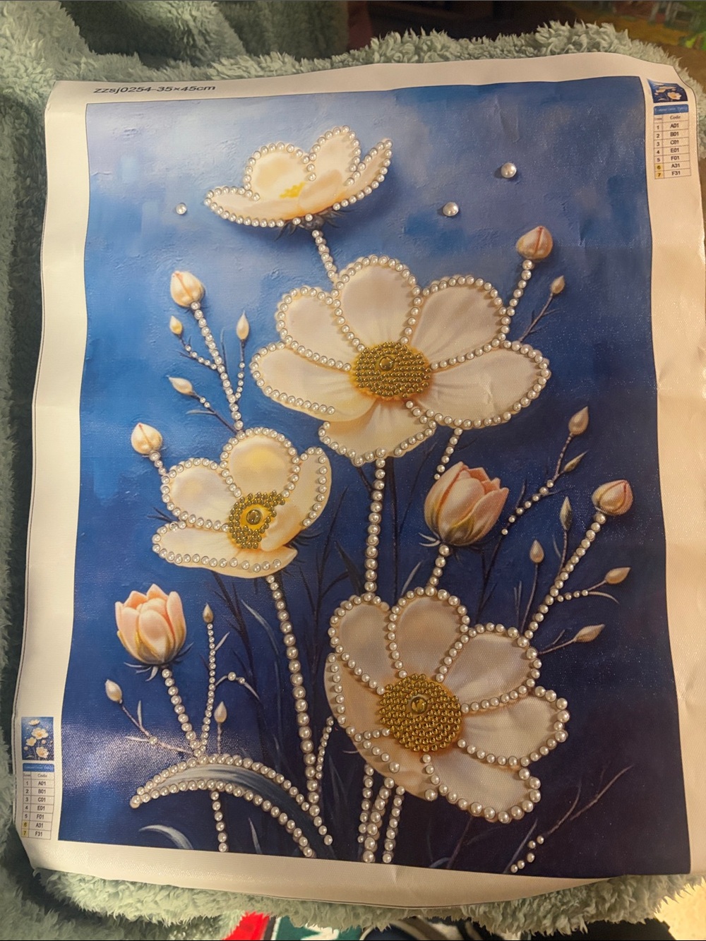 Pearl-Embellished White Flower Wall Art on Blue Canvas Background